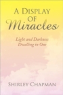 A Display of Miracles : Light and Darkness Dwelling in One - Book