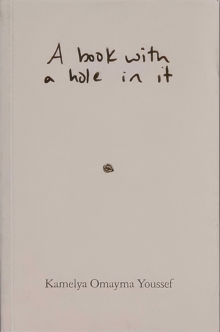 A book with a hole in it