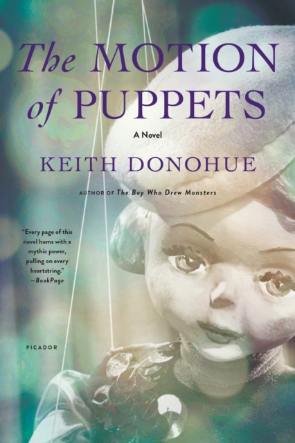 The Motion of Puppets : A Novel, Paperback / softback Book
