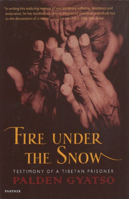 Fire Under The Snow : Testimony of a Tibetan Prisoner, Paperback / softback Book
