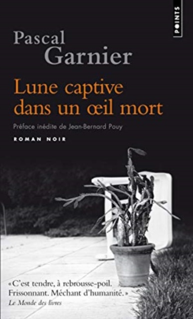 Lune captive dans un oeil mort, Paperback / softback Book