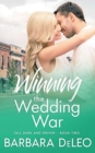 Winning the Wedding War : A sweet small town, enemies to lovers romance - Book