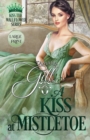 A Kiss at Mistletoe : Large Print - Book