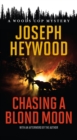 Chasing a Blond Moon : A Woods Cop Mystery - Book