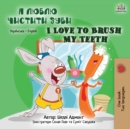 I Love to Brush My Teeth (Ukrainian English Bilingual Book for Kids) - Book