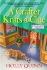 A Crafter Knits A Clue : A Handcrafted Mystery - Book