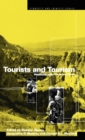 Tourists and Tourism : Identifying with People and Places - Book