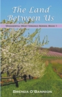 The Land Between Us - Book