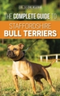 The Complete Guide to Staffordshire Bull Terriers : Finding, Training, Feeding, Caring for, and Loving your new Staffie. - Book