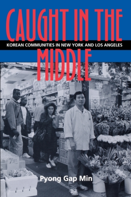 Caught in the Middle : Korean Communities in New York And Los Angeles, Paperback / softback Book