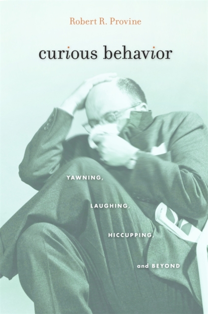 Curious Behavior : Yawning, Laughing, Hiccupping, and Beyond, Paperback / softback Book
