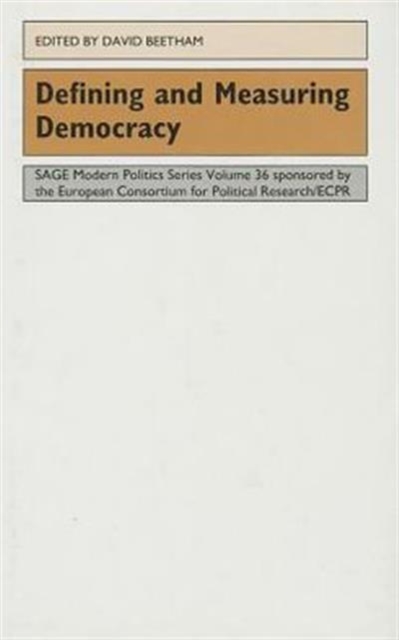 Defining and Measuring Democracy, Hardback Book