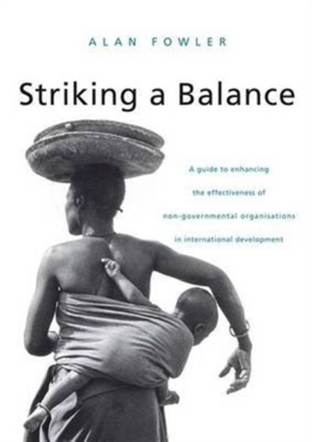 Striking a Balance : A Guide to Enhancing the Effectiveness of Non-Governmental Organisations in International Development, Hardback Book