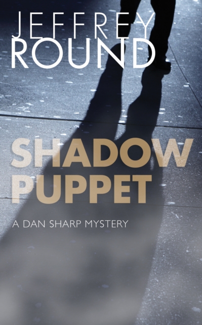 Shadow Puppet : A Dan Sharp Mystery, Paperback / softback Book