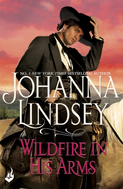 Wildfire In His Arms : A dangerous gunfighter falls for a beautiful outlaw in this compelling historical romance from the legendary bestseller, Paperback / softback Book