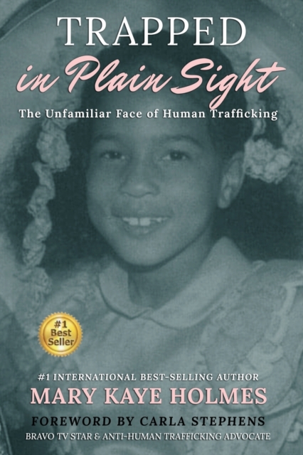 Trapped in Plain Sight : The Unfamiliar Face of Human Trafficking, Paperback / softback Book
