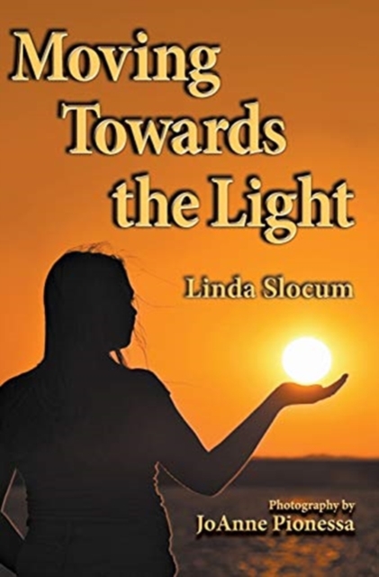 Moving Towards the Light, Hardback Book