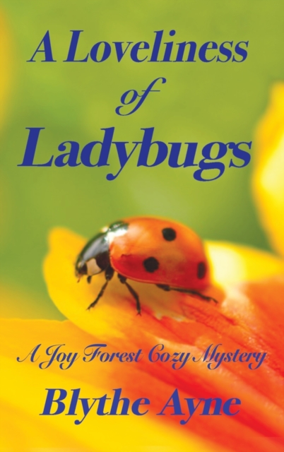 A Loveliness of Ladybugs : A Joy Forest Cozy Mystery, Hardback Book